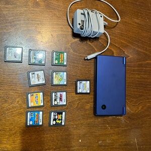 Nintendo DSi and games including Pokémon soul silver